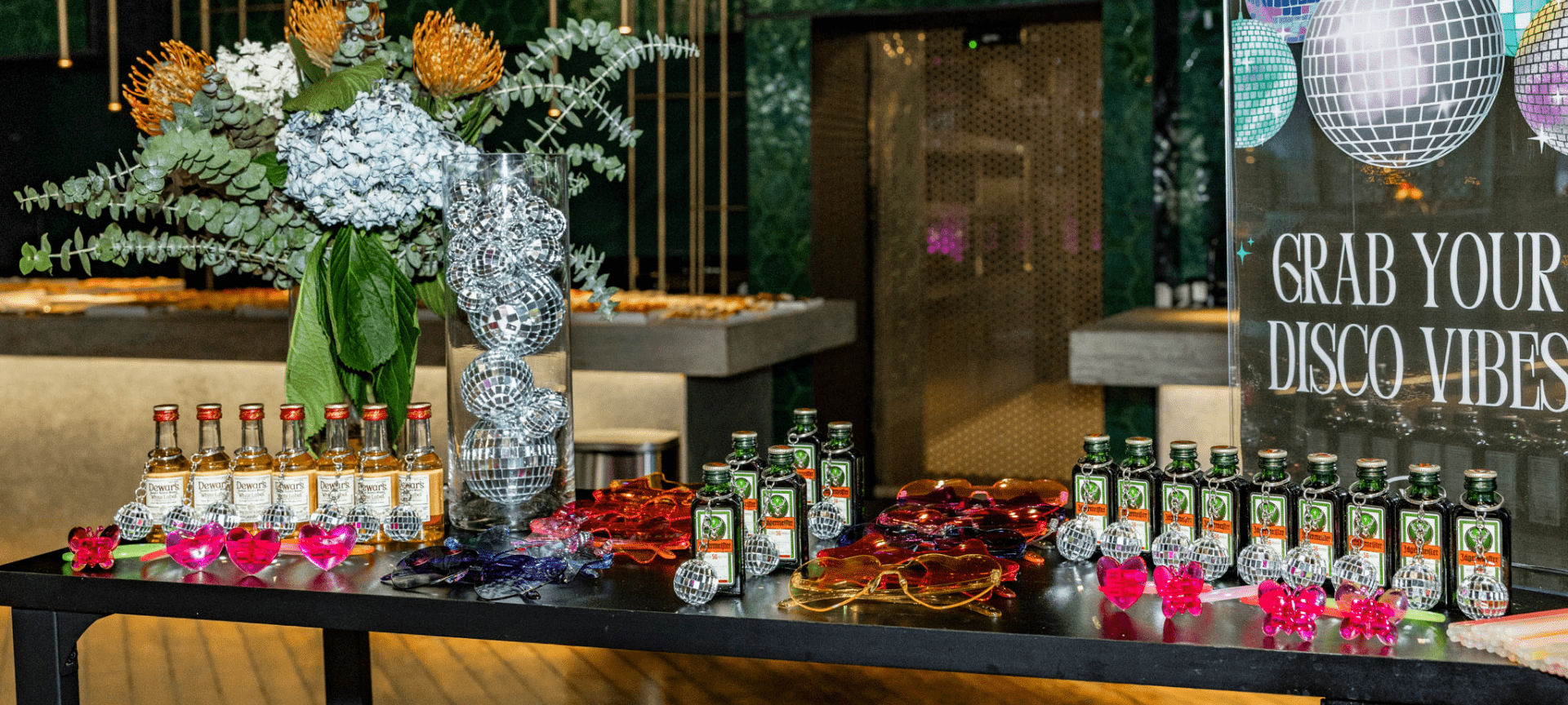 Bar decorated with drinks and accessories during the Crew Disco Night at Marina Port Vell